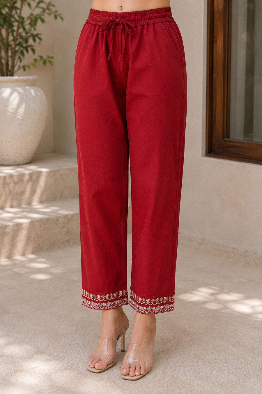 Red embroidered trousers - detail